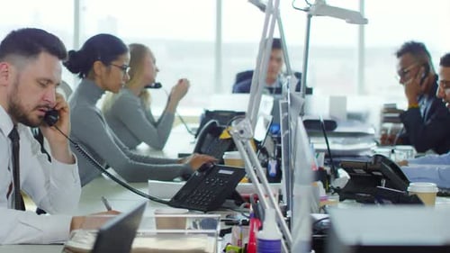 Busy Employees Working at Customer Service