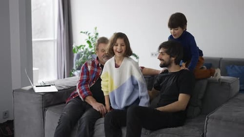 Family Togetherness on Couch at Home