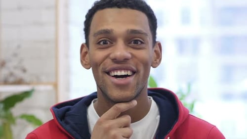 Young Adult Male Laughing Close Up
