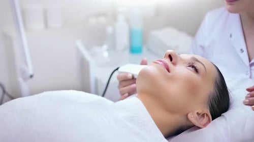 Adorable Young Woman Enjoying Beauty Care Procedure at Spa Salon Medium Closeup