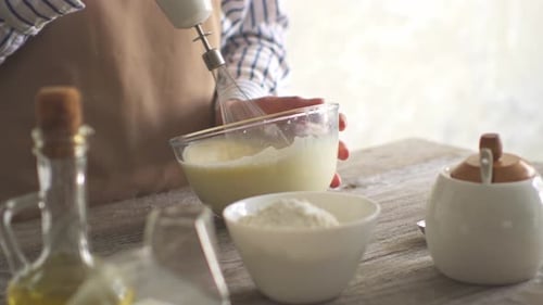 Mixing Batter in a Glass Bowl with Mixer
