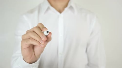 Adult Writes Word Trust on Clear Surface