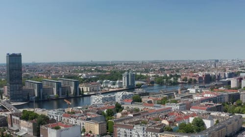 Forwards Fly Above Urban Neighbourhood Towards Spree River