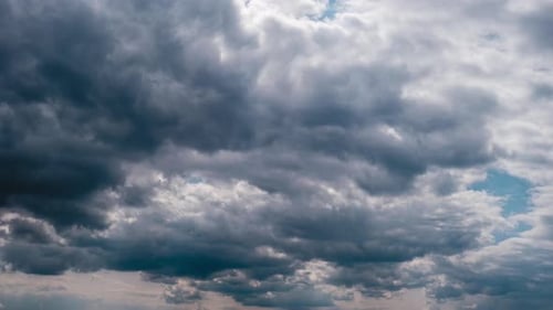 Timelapse of Gray Cumulus Clouds Moves in Blue Dramatic Sky Cirrus Cloud Space