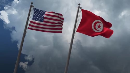 USA and Tunisia National Flags Waving on Cloudy Sky