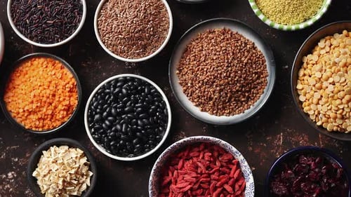 Assortment of colorful nutritious grains and seeds overhead