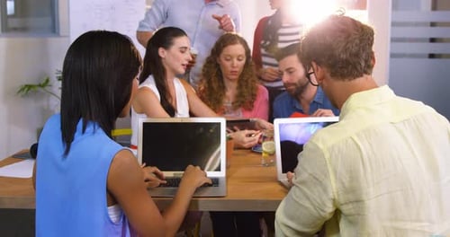 Creative Team Collaborating in Modern Office Workplace