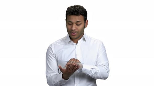 Man Demonstrates Transparent Tablet Technology Device