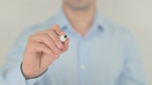 Man Writes Fast on Clear Surface