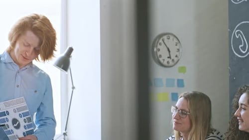 Colleagues Collaborating During an Office Meeting