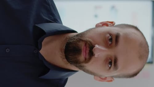 Vertical Video Close Up of Entrepreneur with Corporate Job Looking at Camera