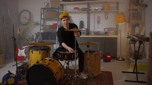 Man Setting Drum Plates