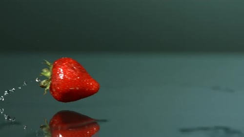 Strawberry Drops in Water with Splash