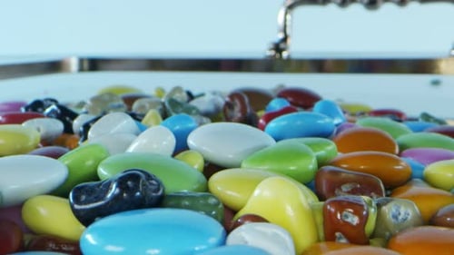 Colorful Candies Rotating on a Serving Tray