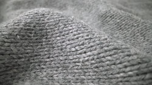 Extreme Detail View of Sheep Wool Cloth Texture Flowing in Macro Dolly Shot