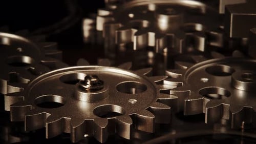 Shiny Gears Turning in a Mechanical System