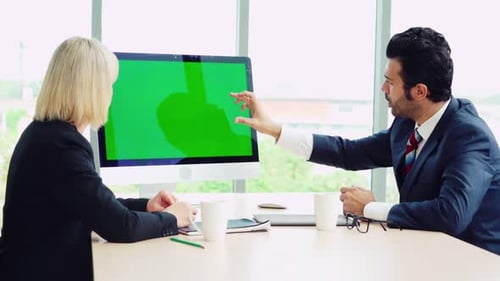 Business People in the Conference Room with Green Screen