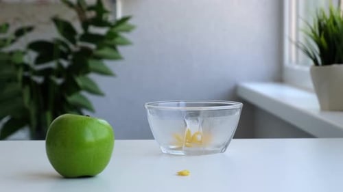 Crispy Yellow Corn Flakes Falling Into the Bowl in the Morning for a Tasty Breakfast