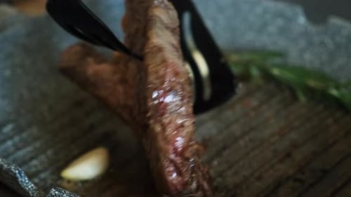 Steak Sizzling in a Hot Grill Pan