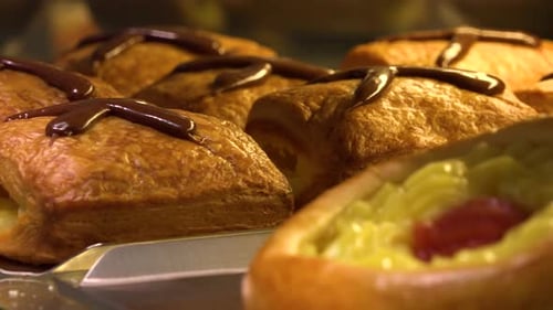 Traditional Czech Pies and Baked Goods in the Background on Display on a Counter in a Bakery