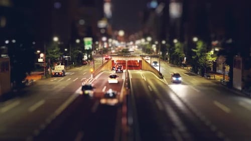 Traffic Travels the City Street at Night