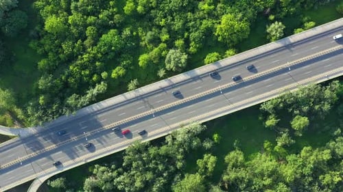 Aerial Drone Flight top down View of freeway busy city rush hour heavy traffic jam highway. Aerial v