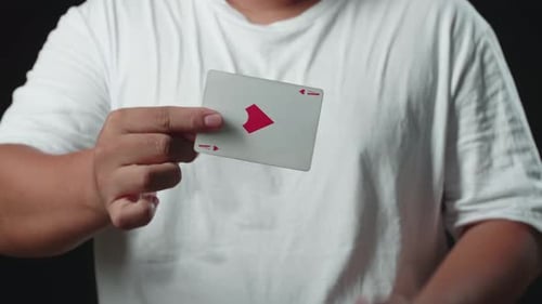 Person Juggling and Fanning Playing Cards Close Up