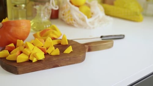 Close Up of Chopped Pumpking on Cutting Board