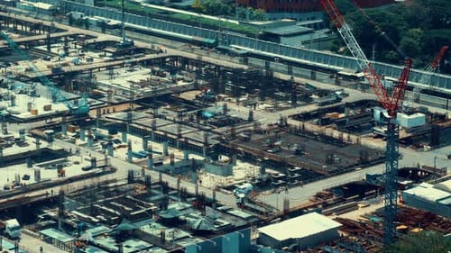 Large Construction Site with Heavy Construction Machinery in Metropolis