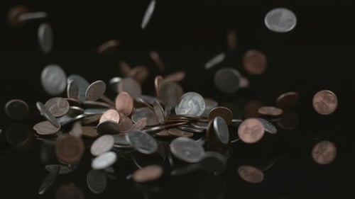 Coins falling in slow motion; shot on Phantom Flex 4K at 1000 fps