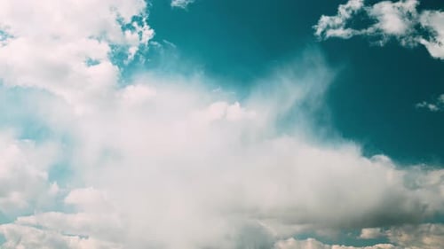 Cloudy Sky With Fluffy Clouds