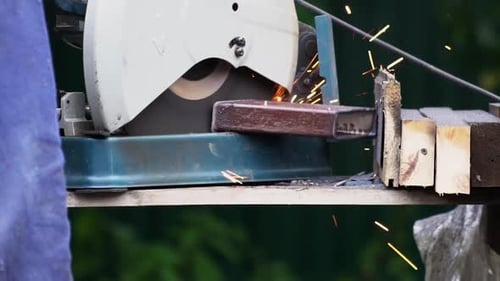 Metal Cutting With Sparks Flying By Chop Saw
