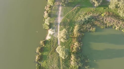 Flight Over the River and Forest at Summer Time.