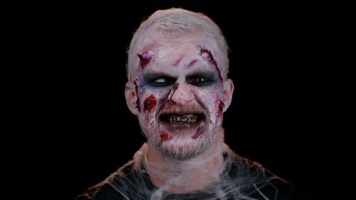 Man with Zombie Makeup and Spiderwebs Close Up