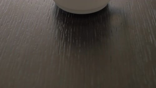 Foamy Coffee Cup on Wooden Table