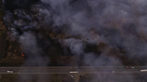 Aerial View of Smoke and Fire near Highway