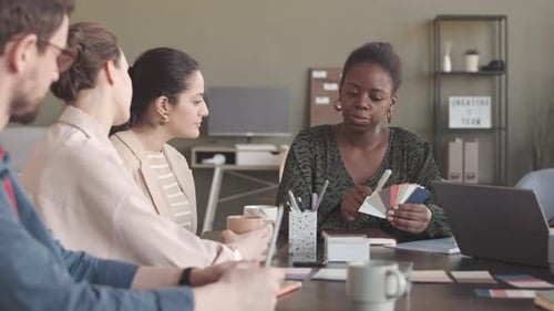 Creative Designers Working on Project in Office