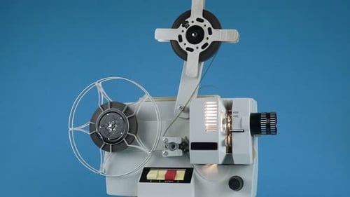 Retro Film Projector Playing with Spinning Reels