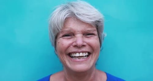 Senior Woman Smiling and Laughing