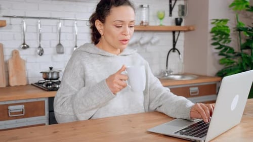 Woman Search Internet Drinking Coffee