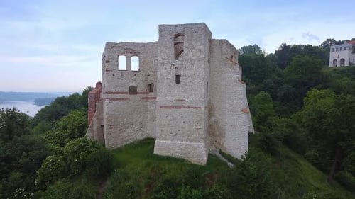 Zoom Shot of Historical Building Situated on Green Hill