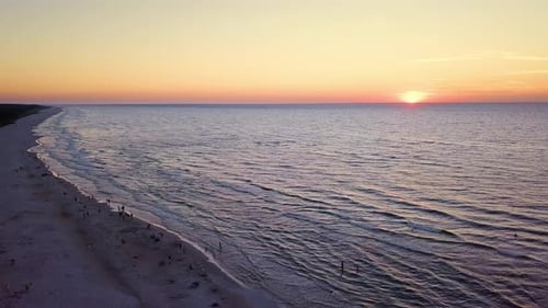 Beach Sunset Aerial View with Calm Waves