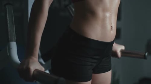 Woman Doing Tricep Dips at the Gym