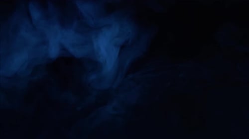 Flowing Blue Smoke on a Black Background
