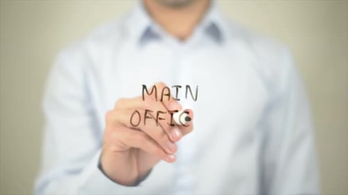Main Office Man Writing on Transparent Screen
