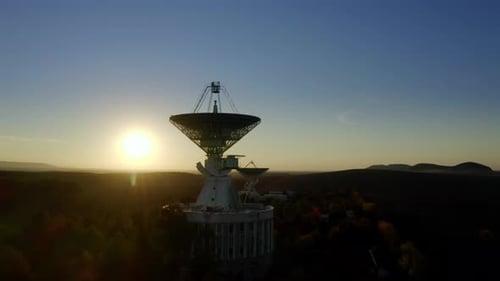 Aerial View of Radio Telescope Antennas at Sunrise