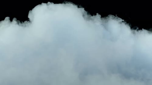 Billowing White Smoke on Black Background