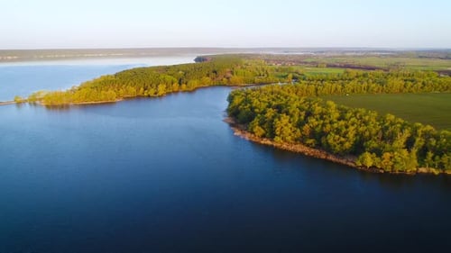 Flying Over the Beautiful Spring River. Aerial Camera Shot. Ukraine.