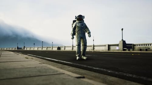 Astronaut in Space Suit on the Road Bridge