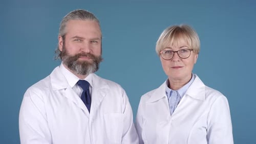 Medical Professionals Smiling in Studio Setting